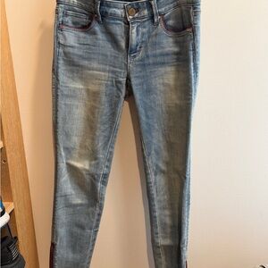 White House Black Market Faded Light Blue Skinny Jeans